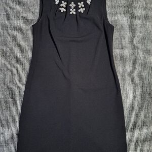 Elegant Black Sleeveless Dress with Floral Embellishments